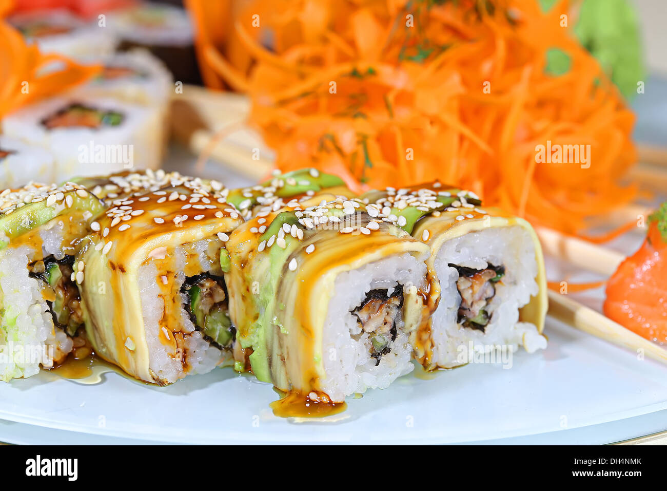 Rolls square with teriyaki sauce and sprinkled with sesame seeds Stock Photo