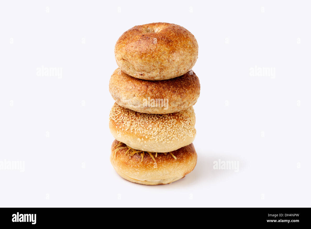 Four Bagels on white background Stock Photo