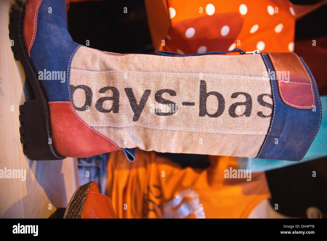 Netherlands, Amsterdam, 27 April Kingsday. Orange fever in shop window of clothing shop. National colors, red, white and blue Stock Photo