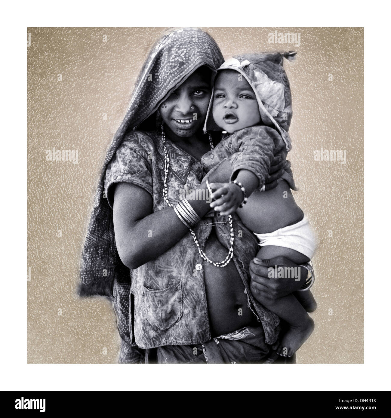 Indian village mother and child Cut Out Stock Images & Pictures - Alamy
