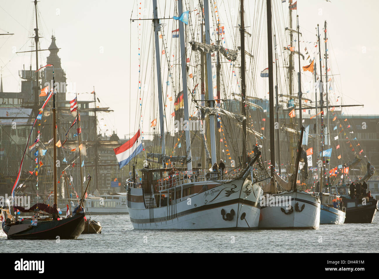 Netherlands, Amsterdam, 30 April 2013, Inauguration of King Willem-Alexander and  Queen Maxima. Ships decorated with many flags Stock Photo