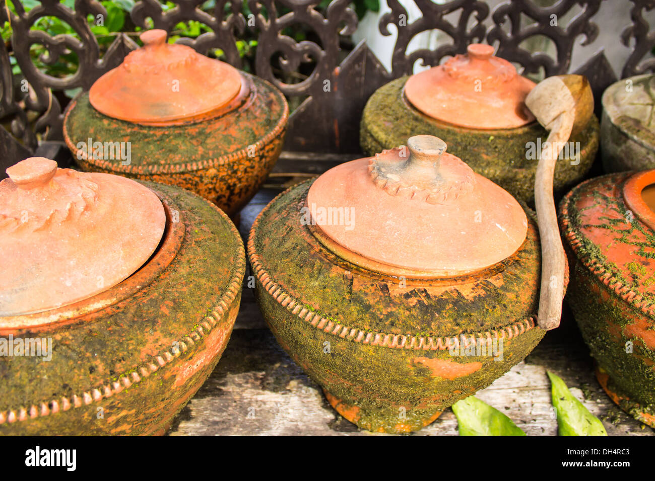 Clay pot on drinking water is the Thai way of life , lanna style Stock Photo