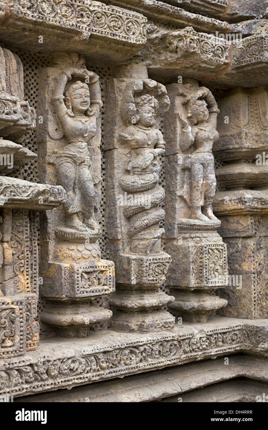 Carved Sculptures of dancers on wall, Konark Sun Temple, Orissa India. UNESCO world heritage site Stock Photo