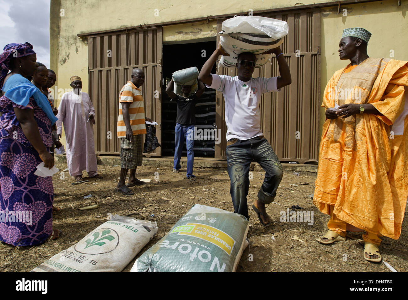 Small farmers using vouchers to purchase fertilizer at a subsidized rate at a distribution center in Bali, Nigeria. Stock Photo