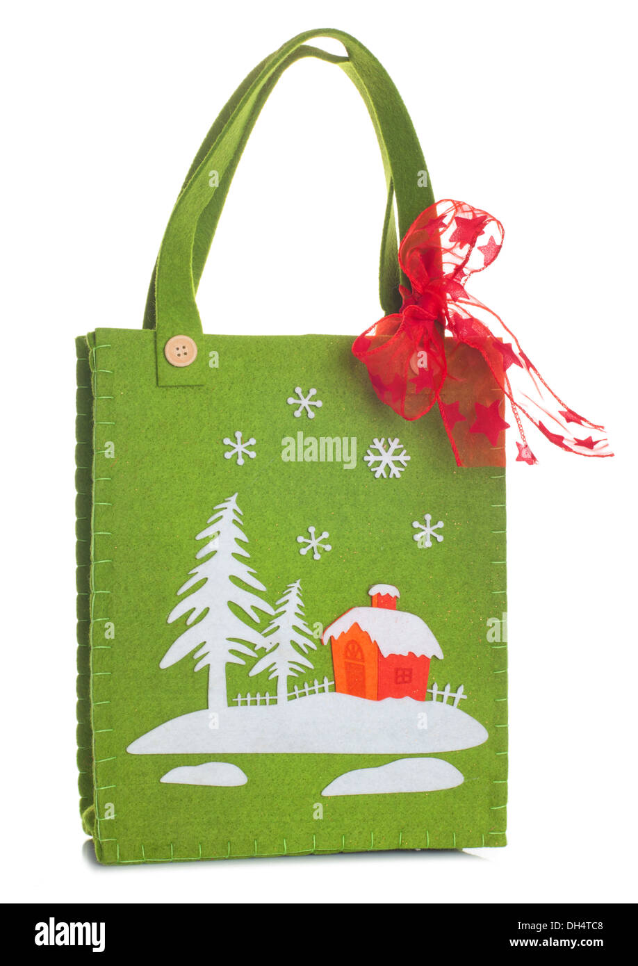 Cloth bag with Christmas decorations on white background Stock Photo