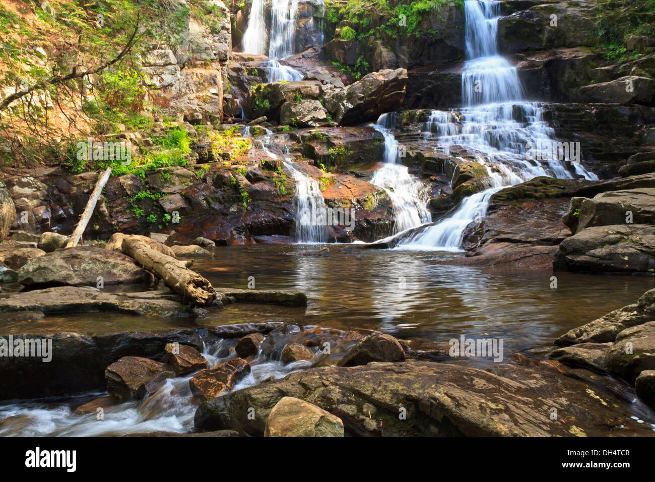 Afternoon sun hits Shelving Rock Falls and pool near Lake in the