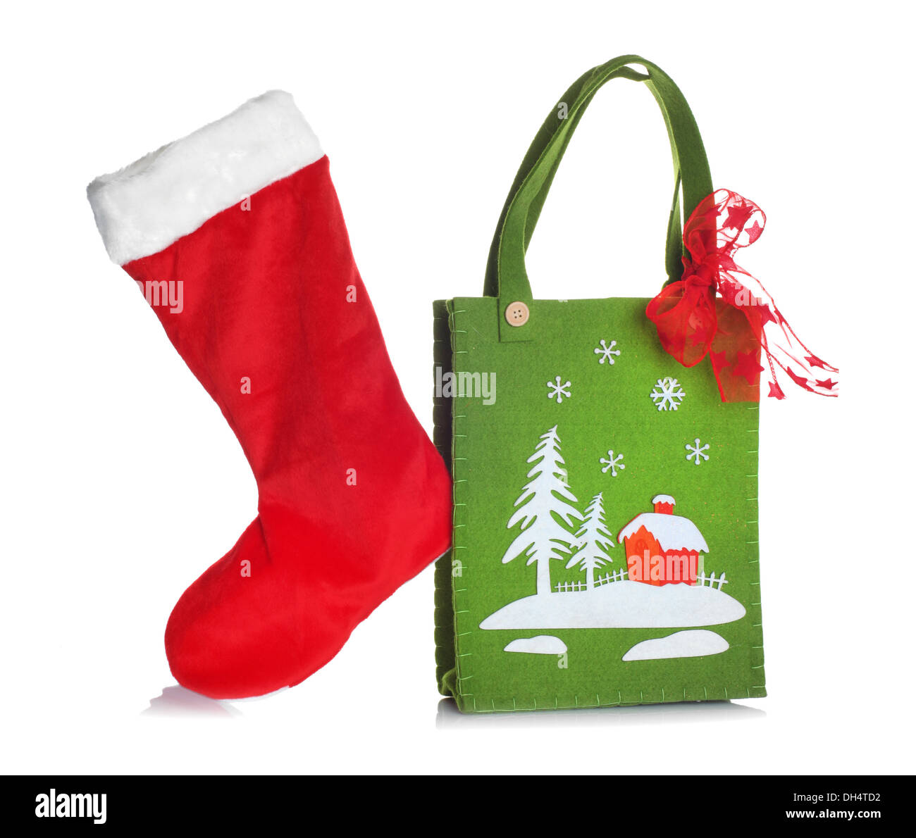 Cloth bag with Christmas decorations on white background Stock Photo