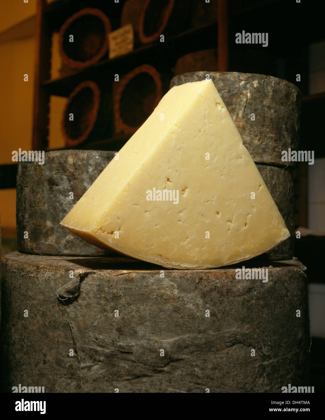 Traditional clothbound Cheddar cheeses. Neal's Yard Dairy, London