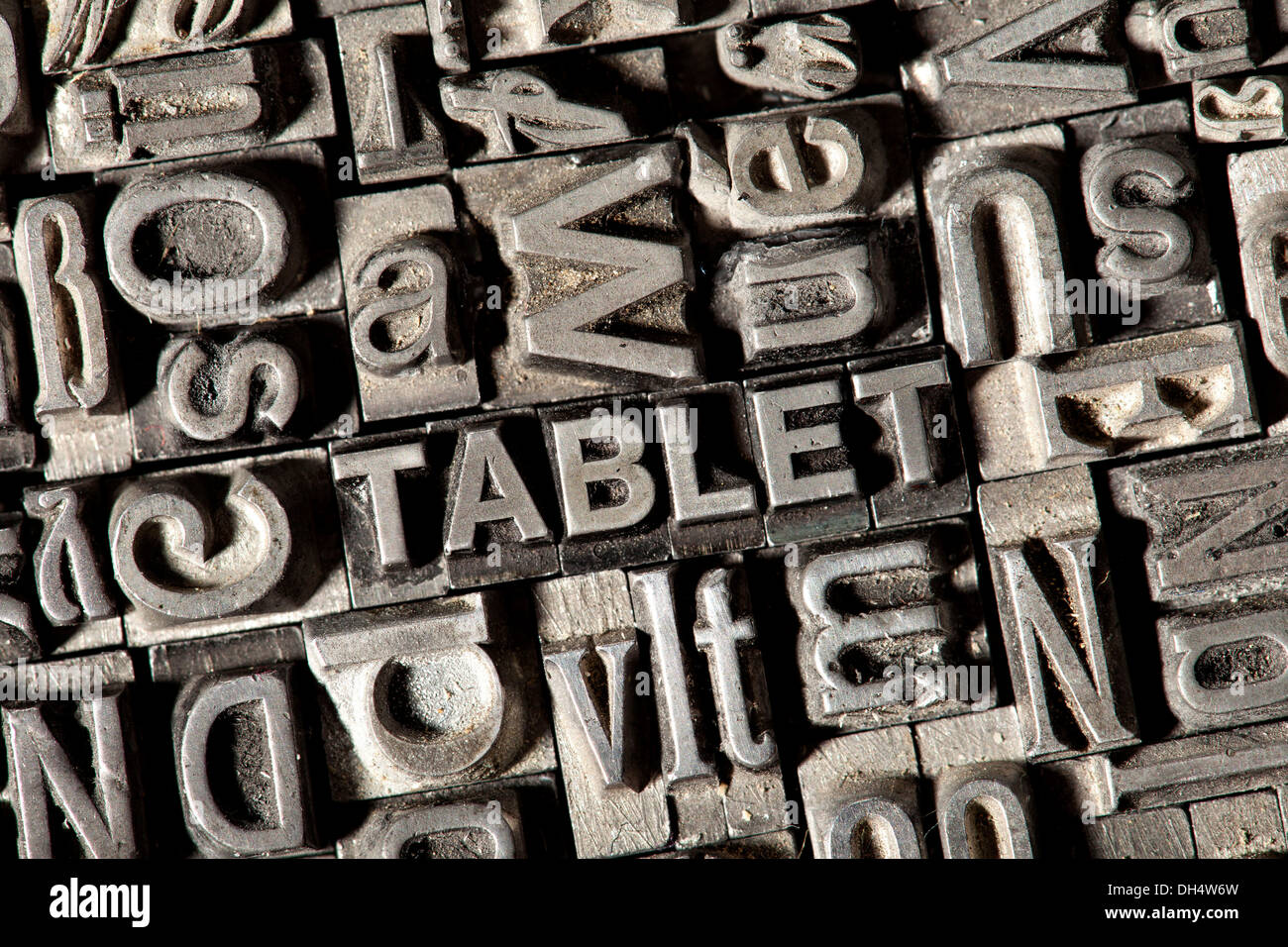 Old lead letters forming the word TABLET Stock Photo