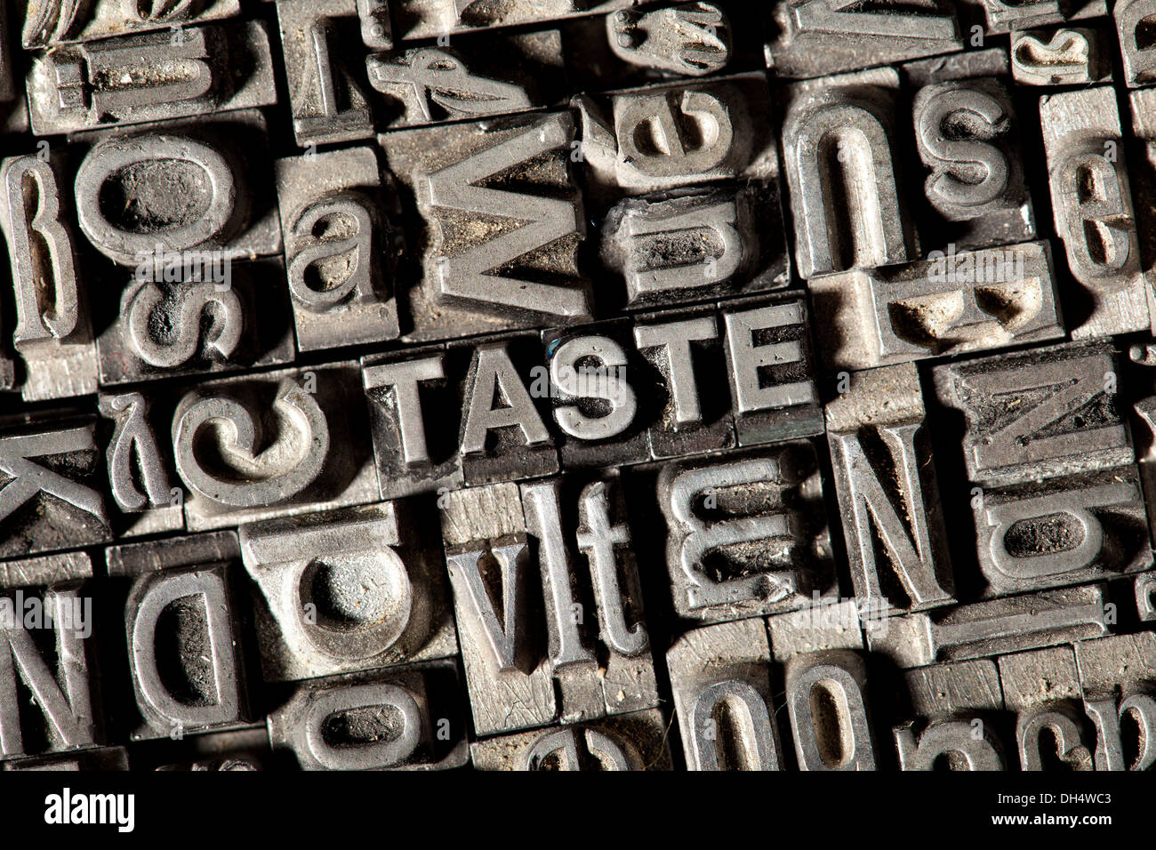 Old lead letters forming the word TASTE Stock Photo Alamy