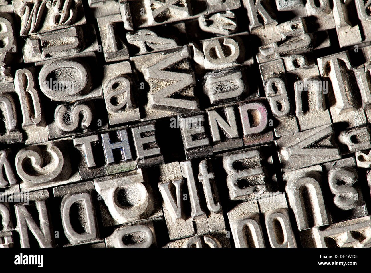 Old lead letters forming the term THE END Stock Photo