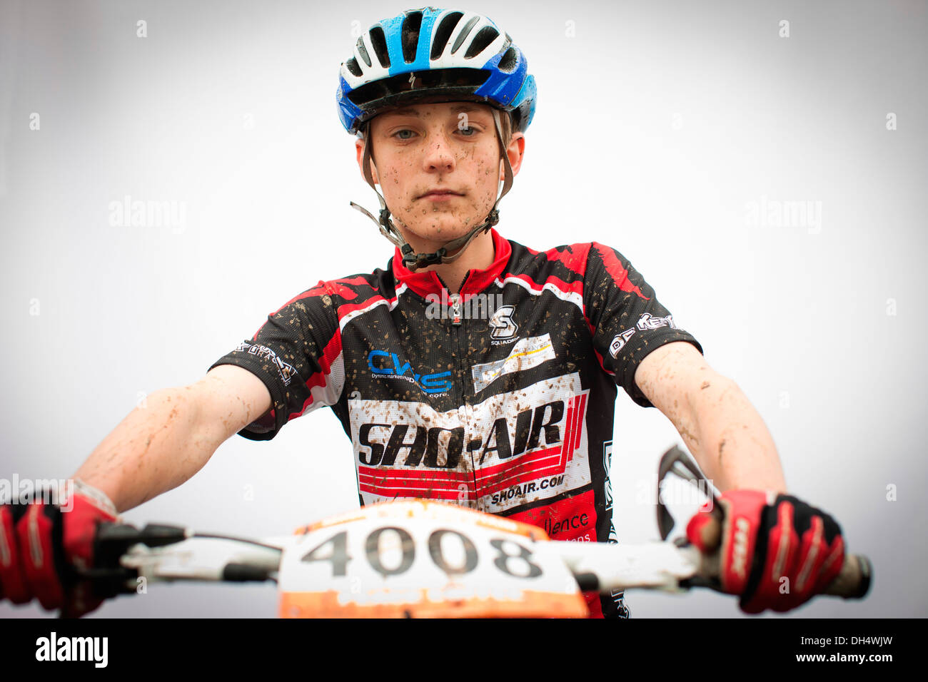 muddy mountain biker Stock Photo Alamy