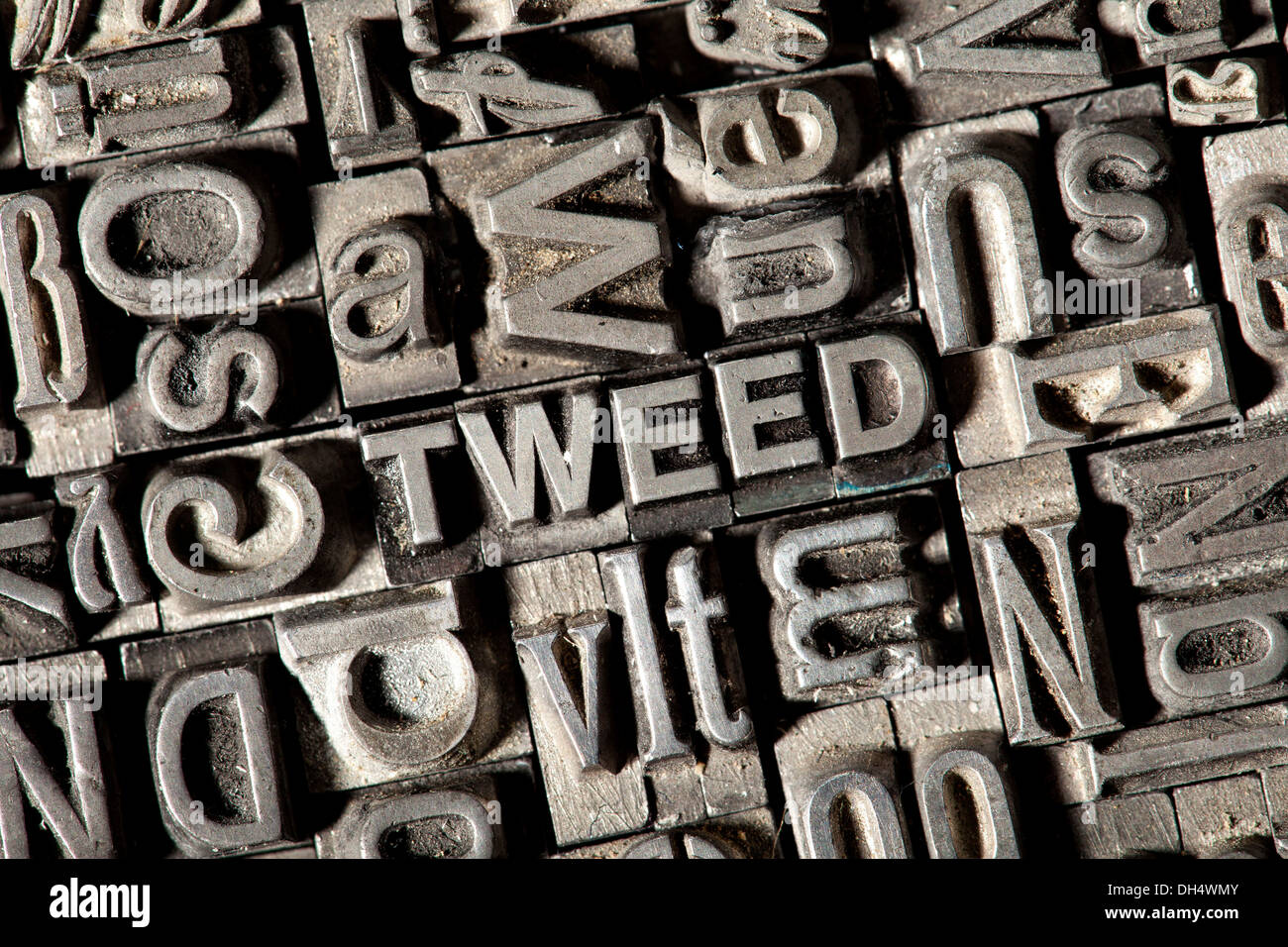 Old lead letters forming the word TWEED Stock Photo