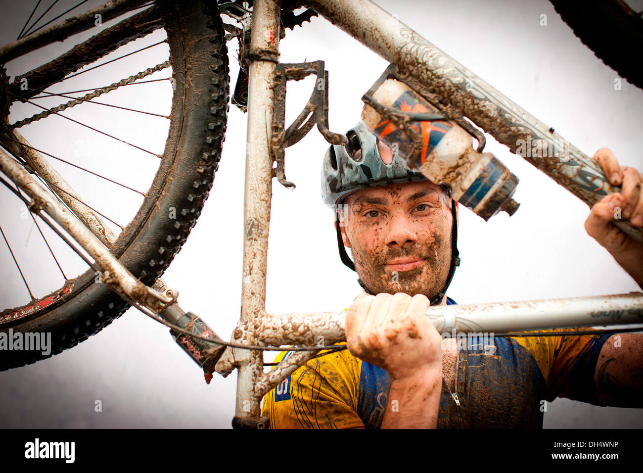 muddy mountain biker Stock Photo Alamy