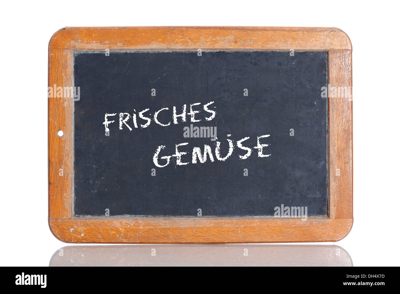 Old school blackboard with the words FRISCHES GEMUESE!, German for Fresh vegetables Stock Photo