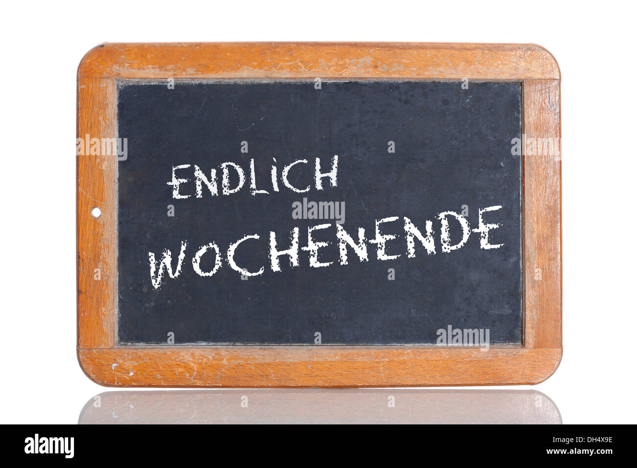 Old chalkboard, lettering 'ENDLICH WOCHENENDE', German for 'FINALLY, IT'S THE WEEKEND!' Stock Photo