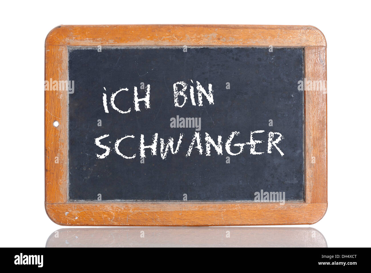 Old school blackboard with the words ICH BIN SCHWANGER, German for I am pregnant Stock Photo