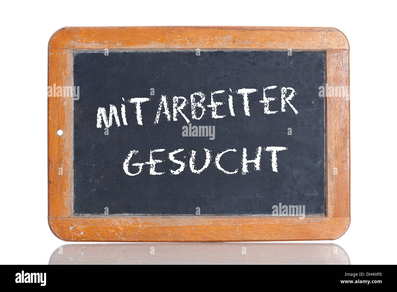 Old school blackboard with the words MITARBEITER GESUCHT, German for Staff wanted Stock Photo