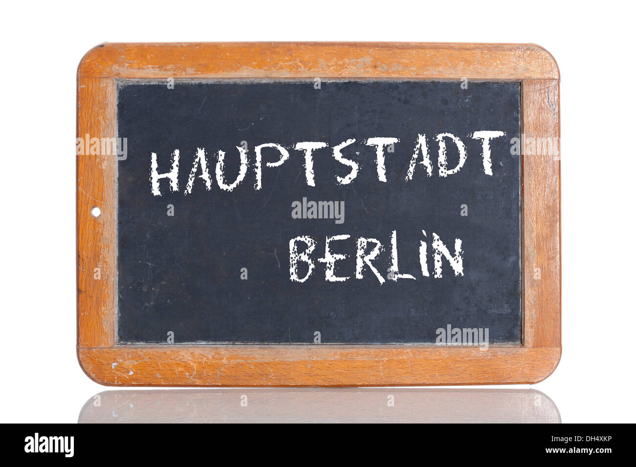 Old school blackboard with the words HAUPTSTADT BERLIN, German for the capital city of Berlin Stock Photo