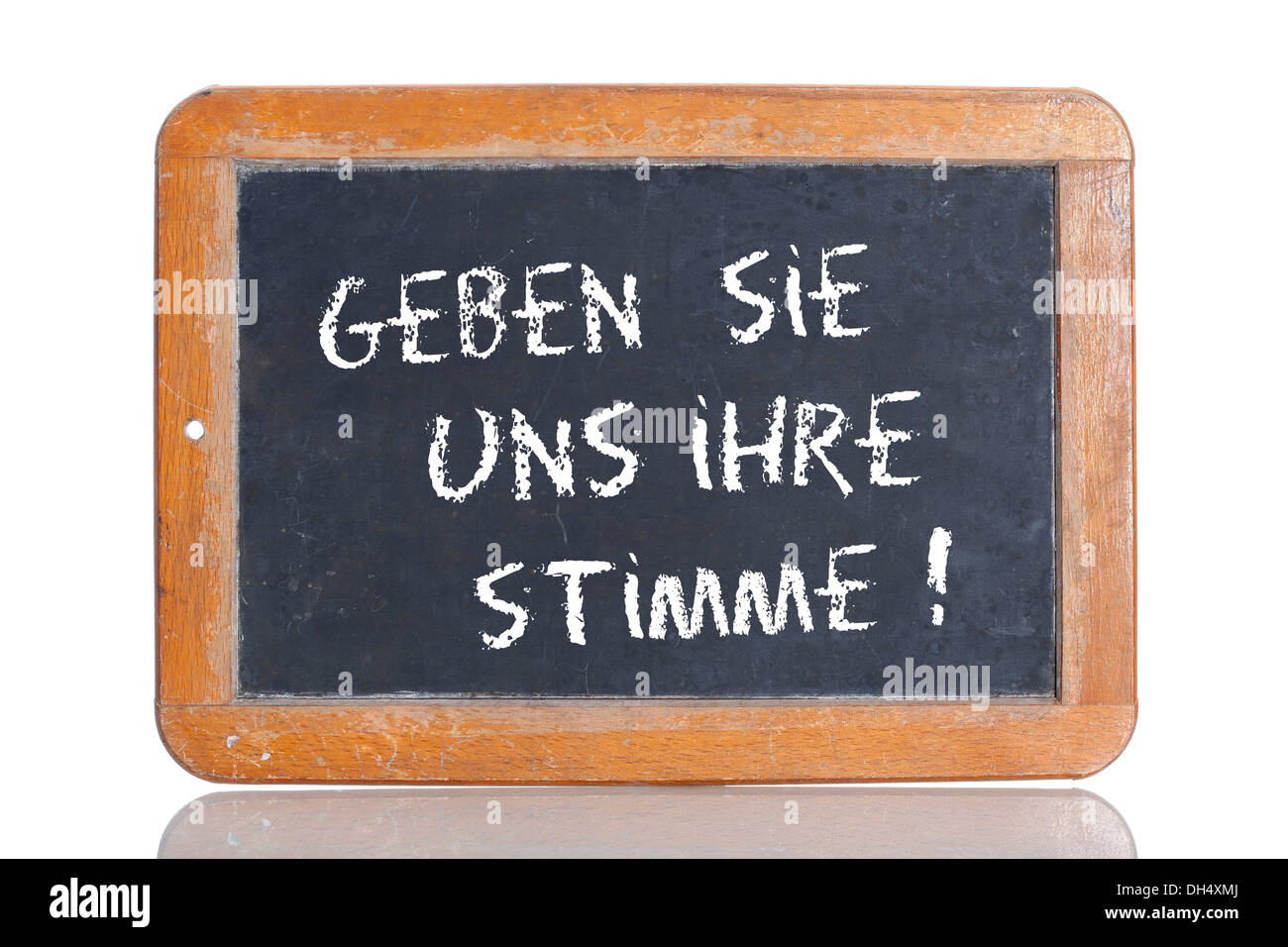 Old school blackboard with the words GEBEN SIE UNS IHRE STIMME!, German for Give us your vote! Stock Photo
