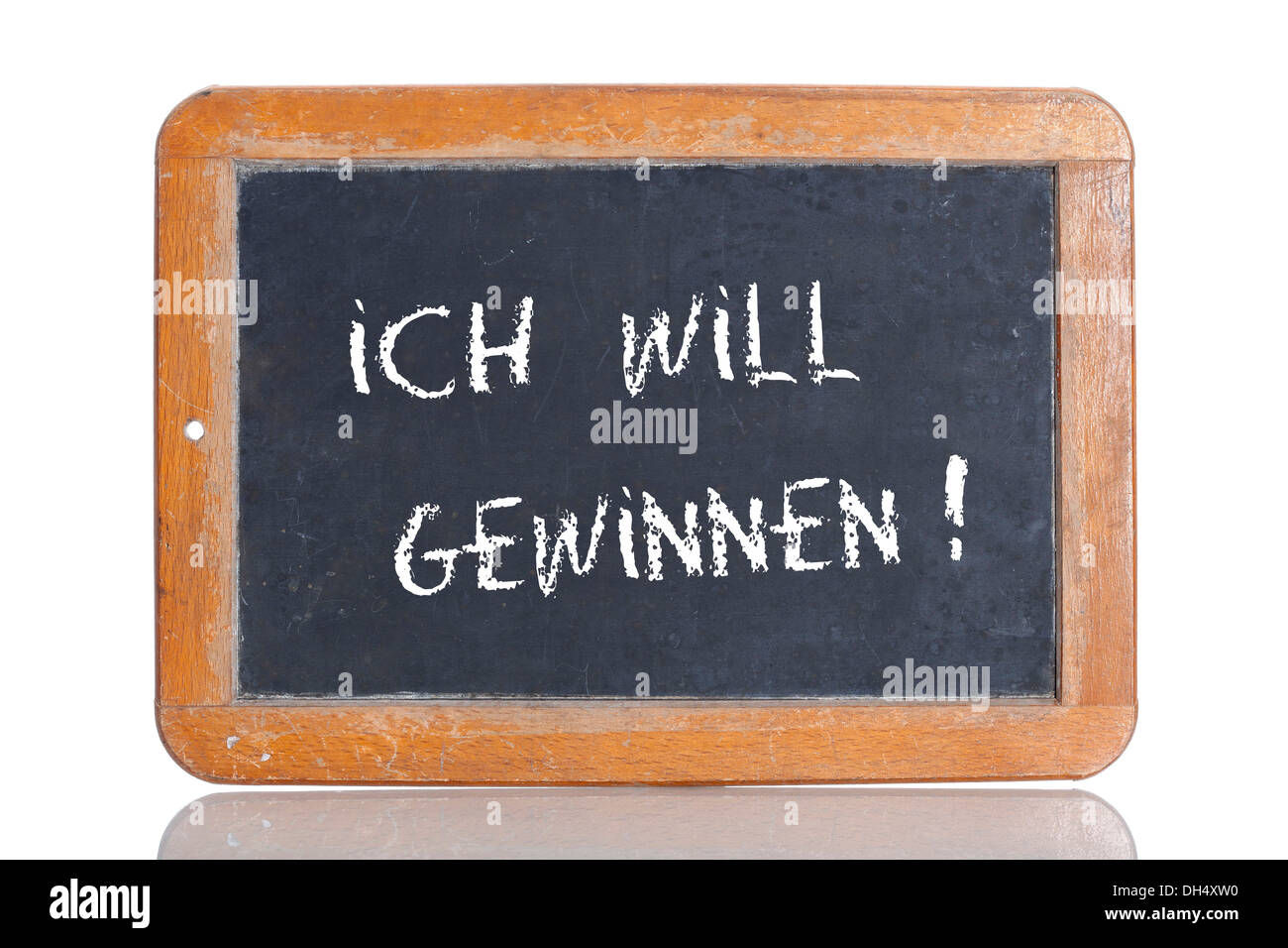 Old school blackboard with the words ICH WILL GEWINNEN!, German for I want to win! Stock Photo