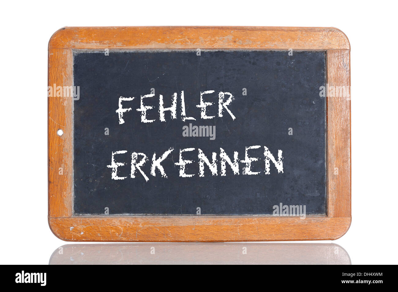Old school blackboard with the words FEHLER ERKENNEN, German for Detect errors Stock Photo