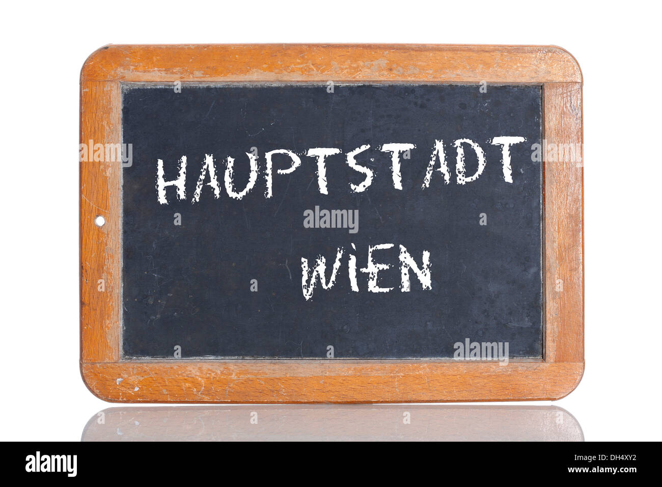 Old school blackboard with the words HAUPTSTADT WIEN, German for the capital city of Vienna Stock Photo