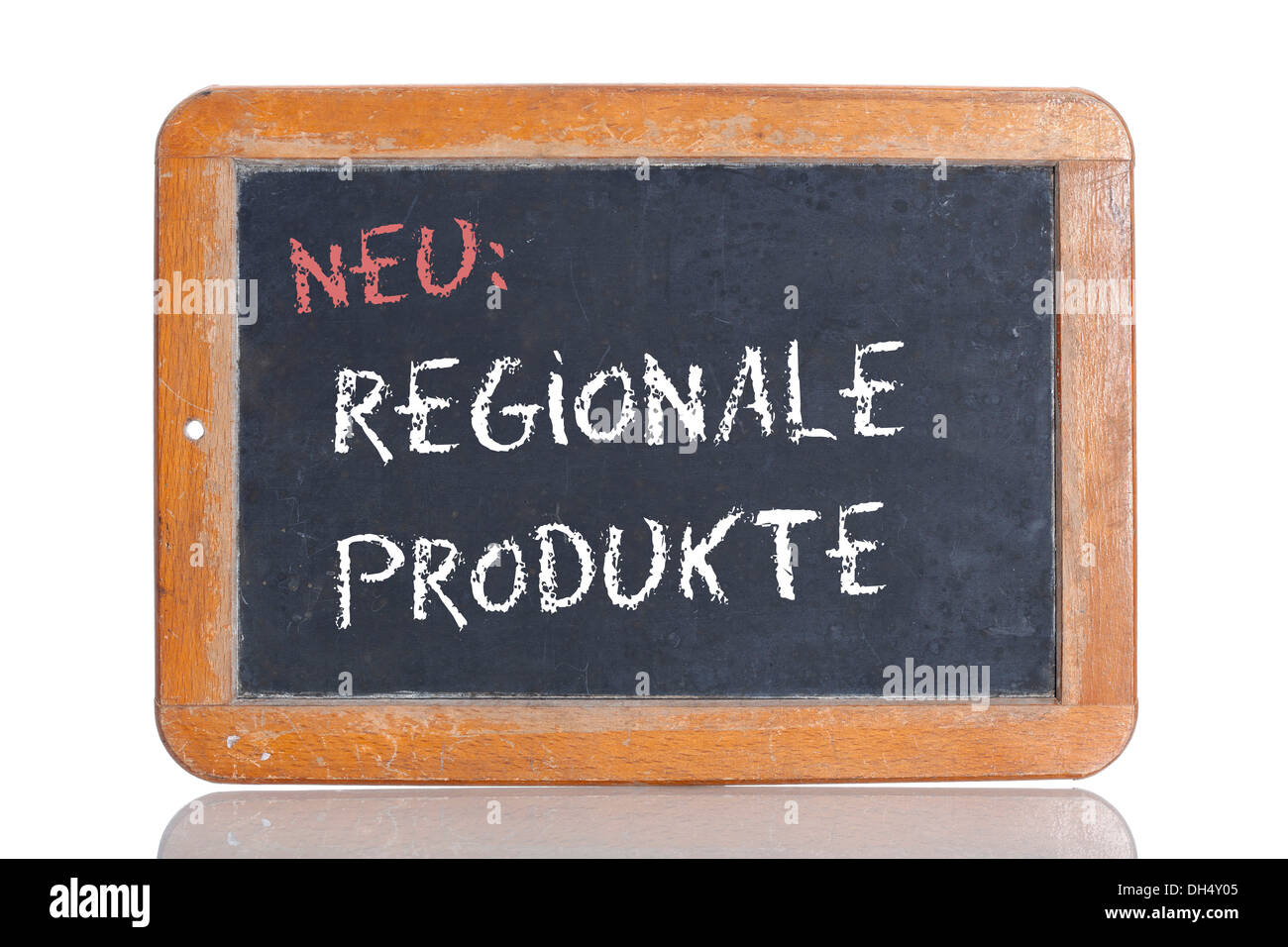 Old school blackboard with the words NEU: REGIONALE PRODUKTE, German for New: Regional products Stock Photo