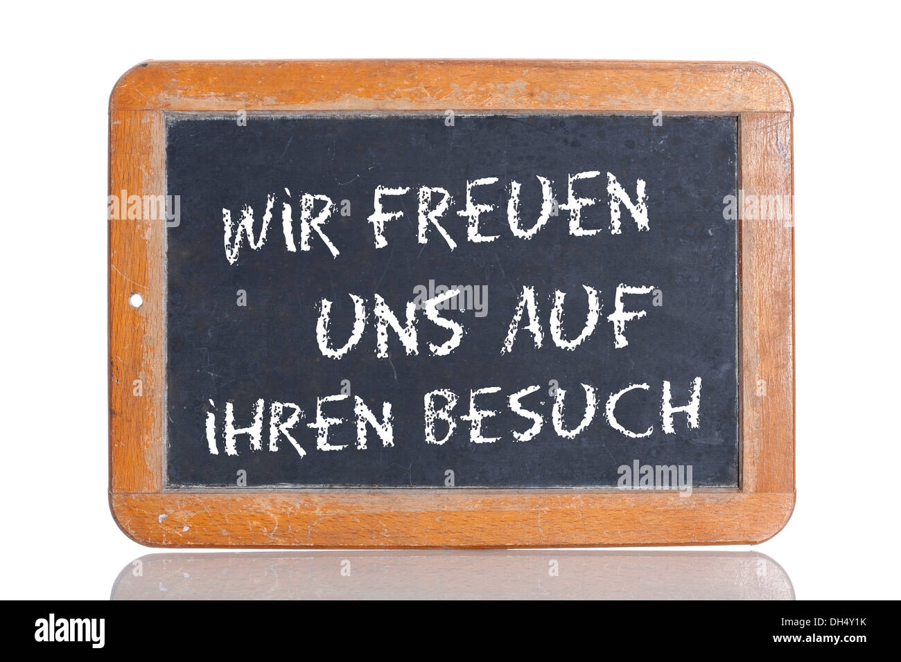 old school blackboard with the words wir freuen uns auf ihren besuch DH4Y1K