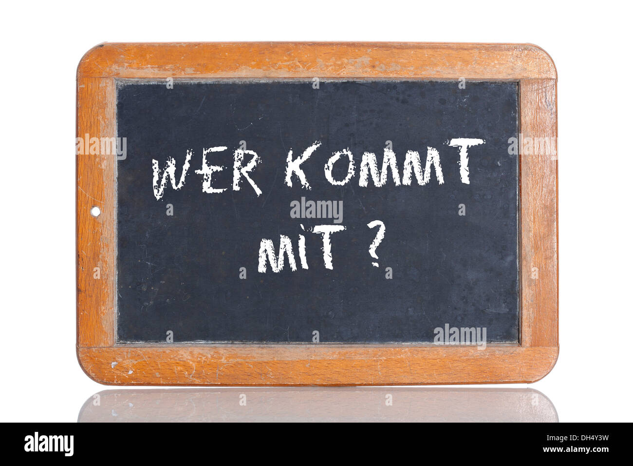 Old school blackboard with the words WER KOMMT MIT?, German for Who's coming? Stock Photo