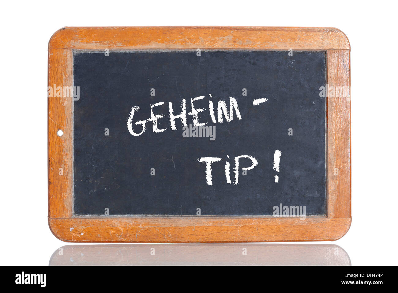 Old school blackboard with the term GEHEIMTIPP, German for secret tip Stock Photo