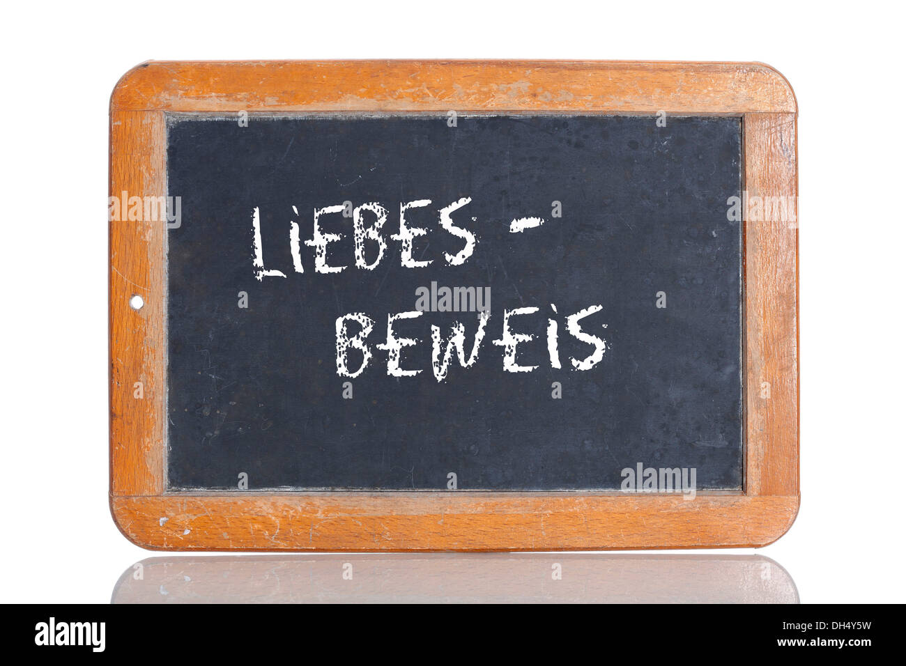 Old school blackboard with the term LIEBESBEWEIS, German for proof of love Stock Photo