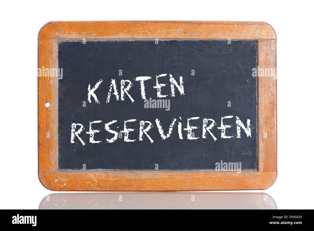 Old chalkboard, lettering 'KARTEN RESERVIEREN', German for 'BOOK TICKETS' Stock Photo