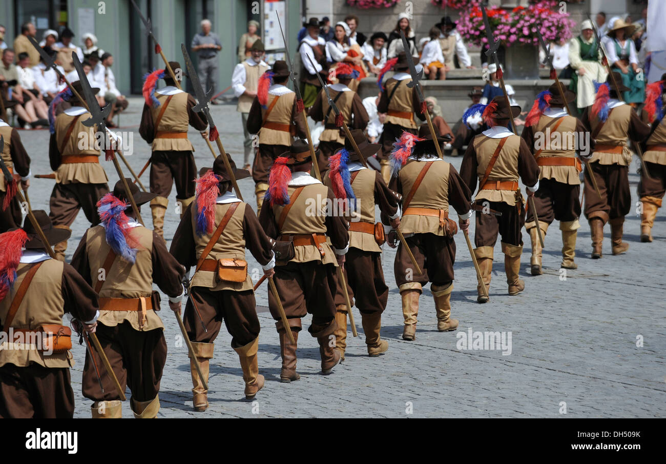 Performers in historical costumes during a parade at the Wallenstein Festival in the market square of Memmingen, Bavaria Stock Photo