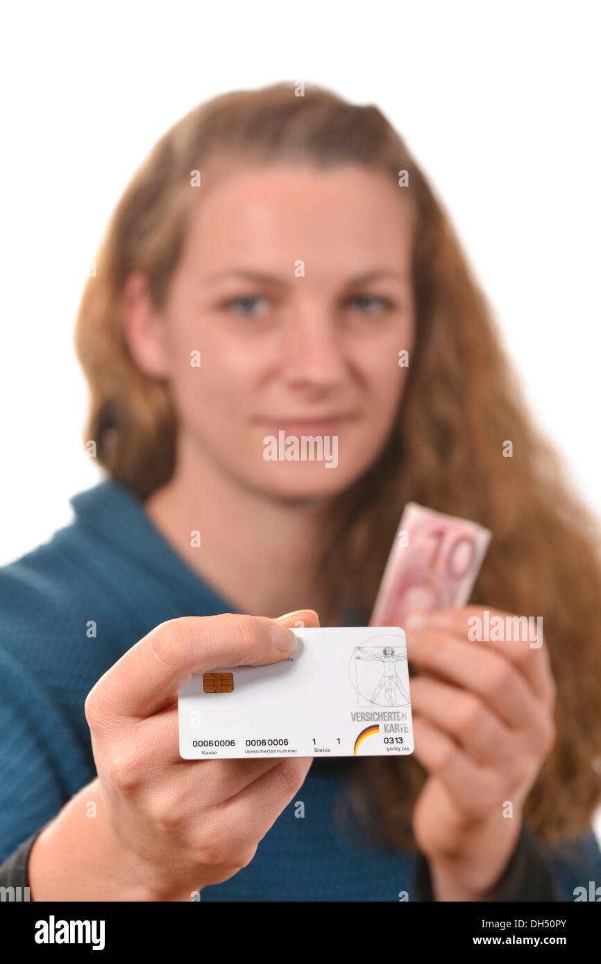 Woman holding a health insurance card and a 10 euro banknote Stock Photo