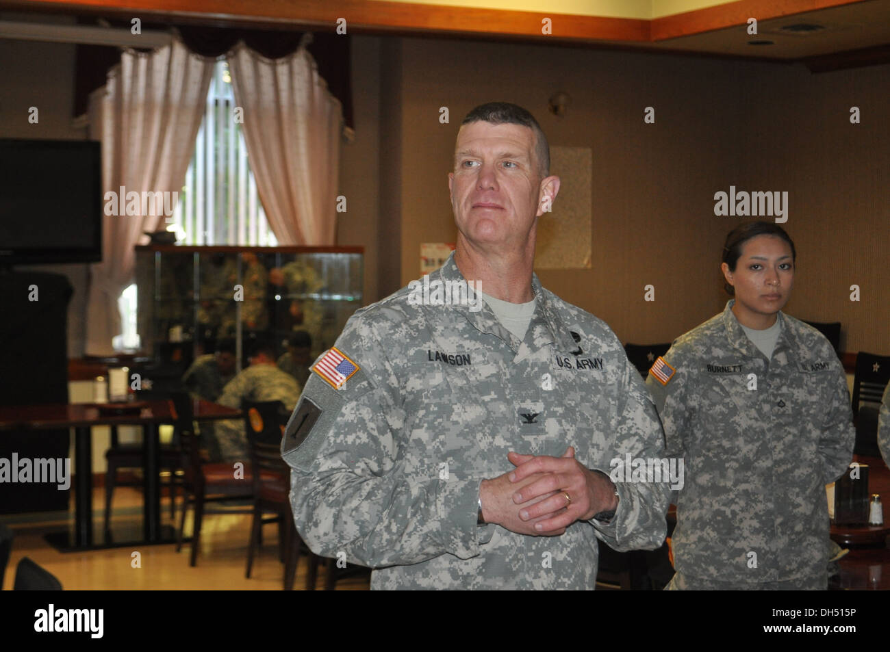 Col. Michael J. Lawson, the 210th Fires Brigade commander, addresses his Soldiers during a celebration of 2nd Infantry Division's 96th birthday at the Thunder Inn dining facility on Camp Casey, South Korea Oct. 25, 2013. The 2nd Infantry Division works wi Stock Photo