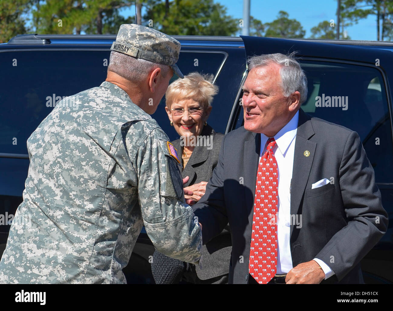 Georgia Governor Nathan Deal and his wife, Sandra, are greeted by Maj. Gen. John M. Murray, 3rd ID commanding general, as they arrive at Fort Stewart, Oct. 23, to discuss the future of veterans in the workplace throughout the state of Georgia. Stock Photo