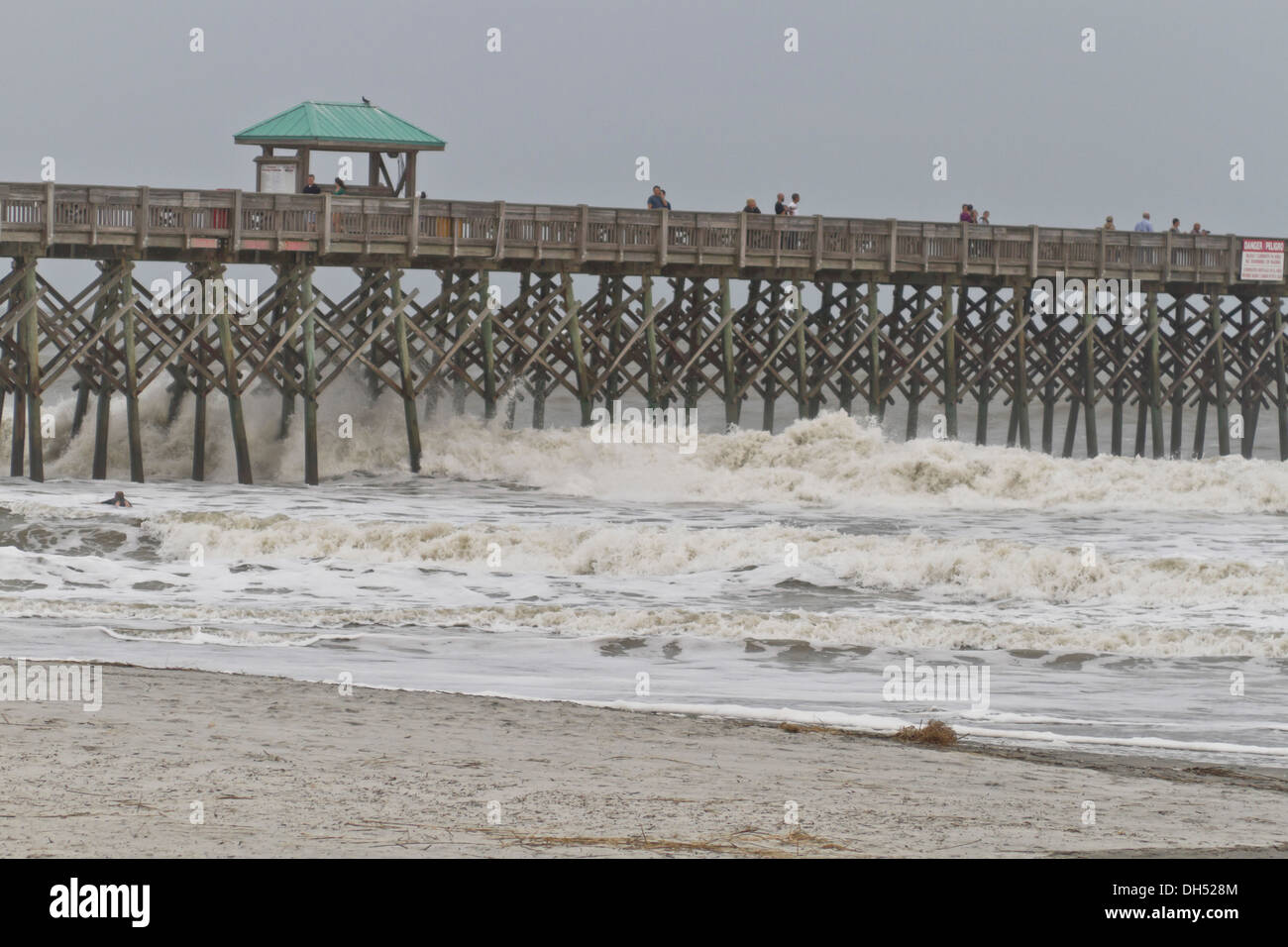 Folly Beach, South Carolina, USA: Hurricane Sandy hits a pier on October 26, 2012 on Folly beach, South Carolina, USA Stock Photo