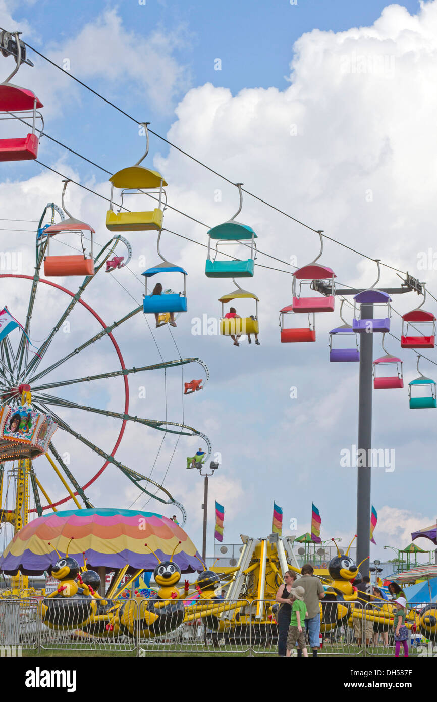 People enjoy colorful rides at the North Carolina State Fair on 