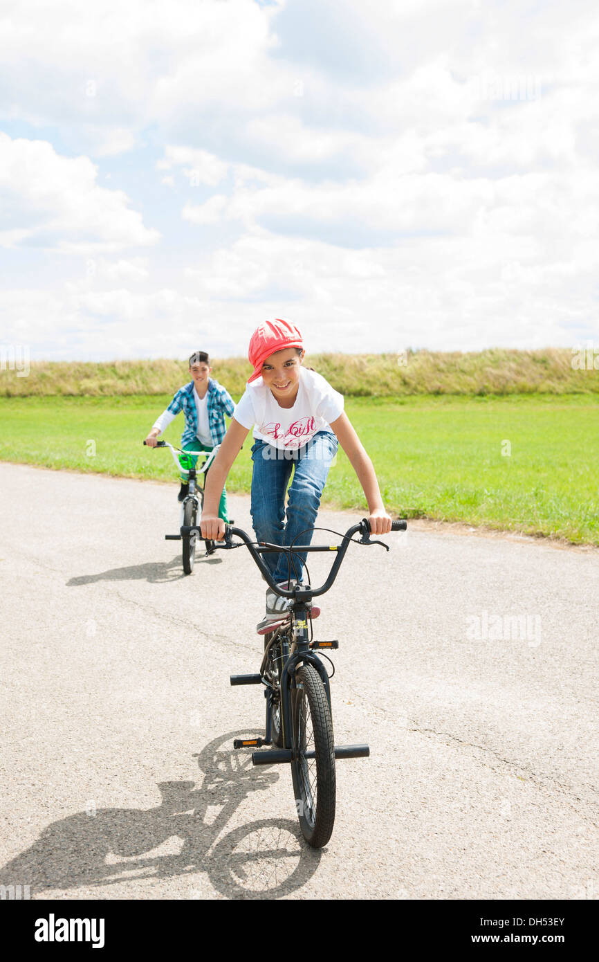 Two boys cycling Stock Photo Alamy