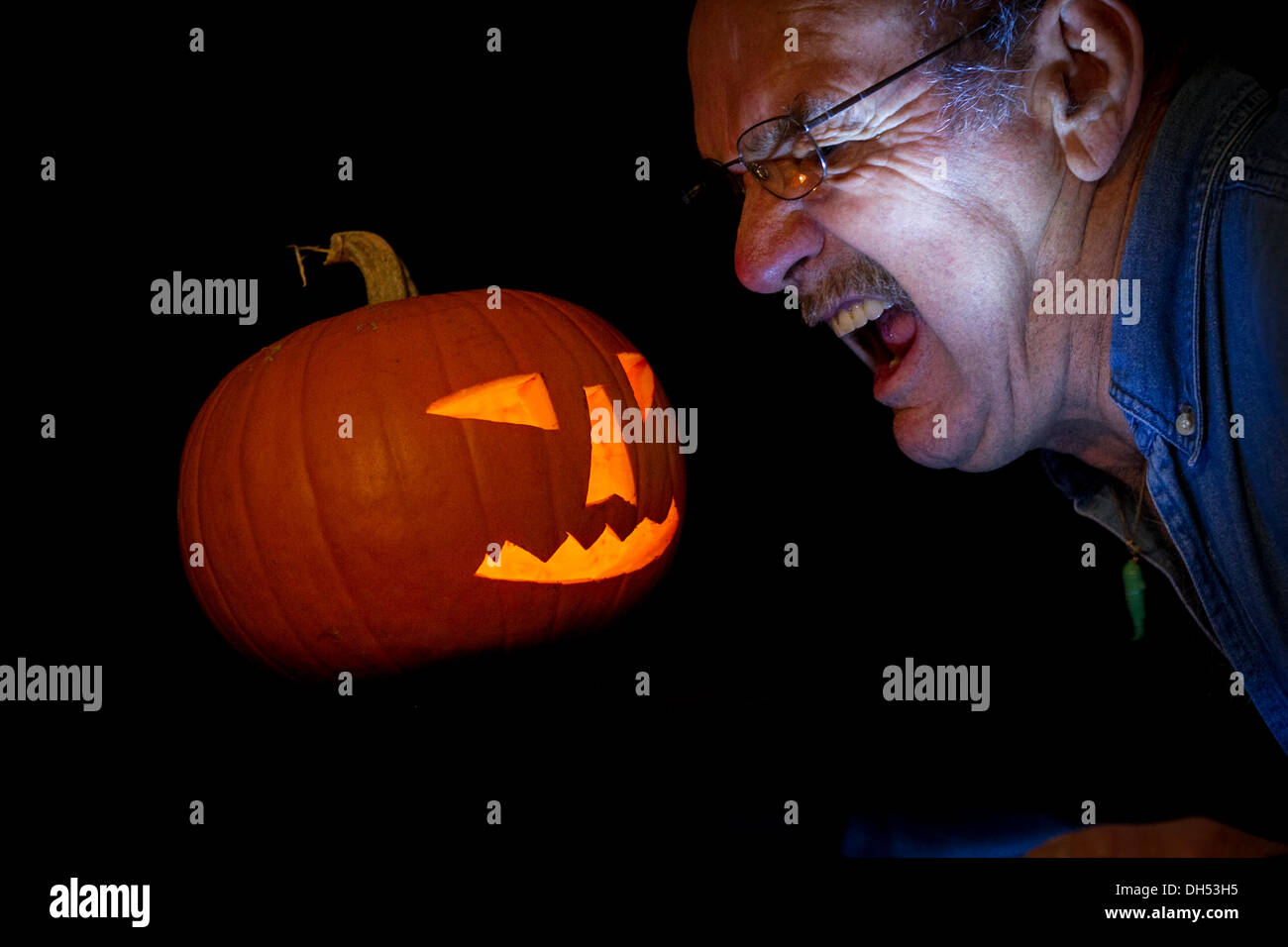 Northampton, UK. 31st October 2013. Grandad and Grandaughter after carving a pumpkin for Halloween Credit:  Keith J Smith./Alamy Live News Stock Photo