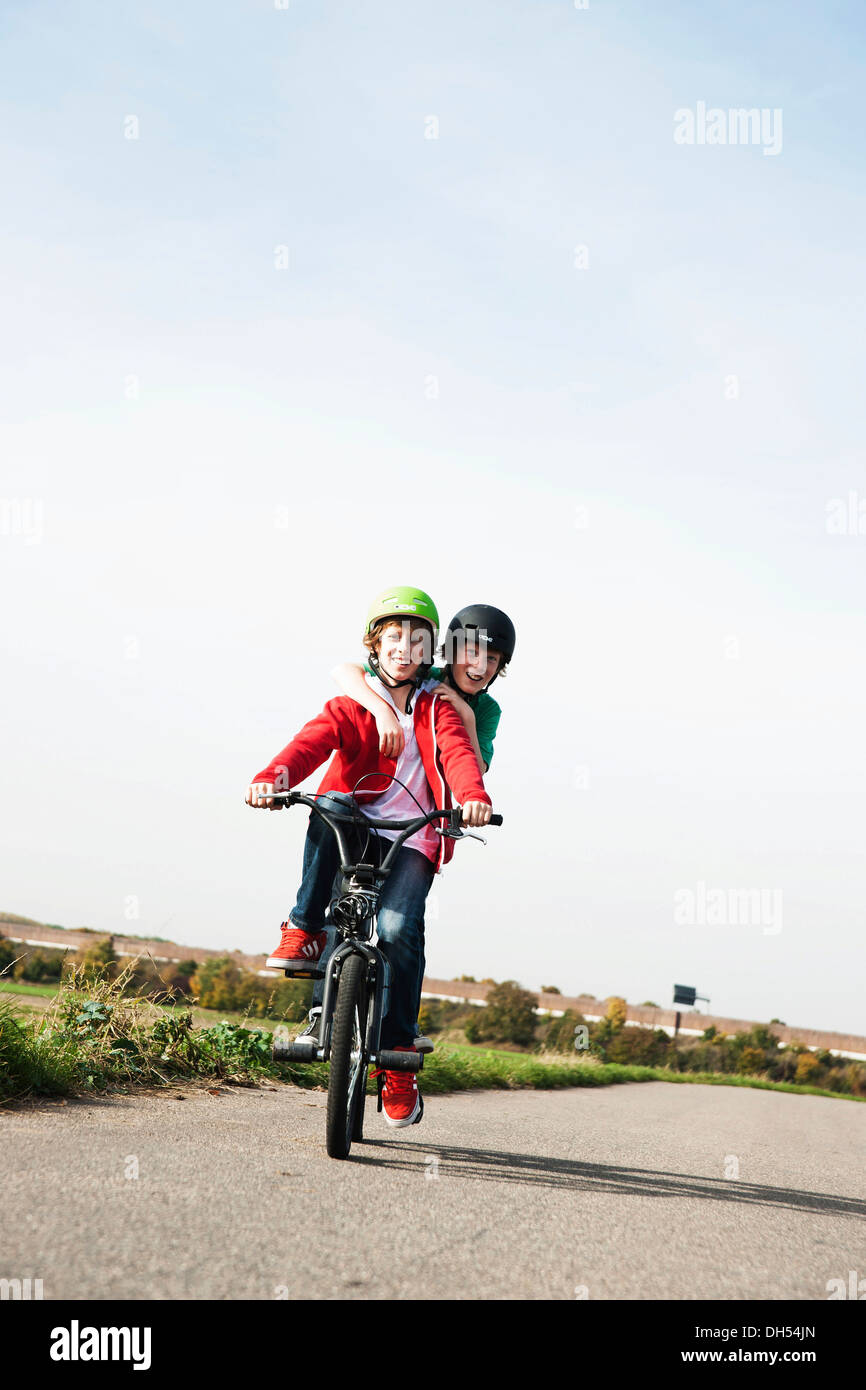 Two cool boys on a BMX bike Stock Photo