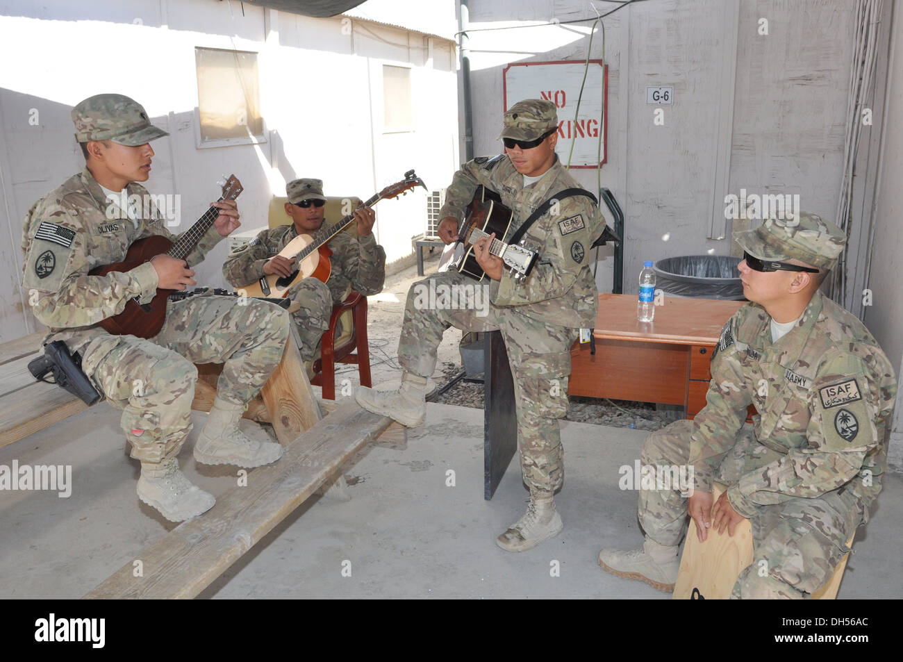 BAND OF ISLAND BROTHERS -- Musicians disguised as Soldiers from Echo Company, 1st Battalion, 294th Infantry Regiment, Guam Army Stock Photo