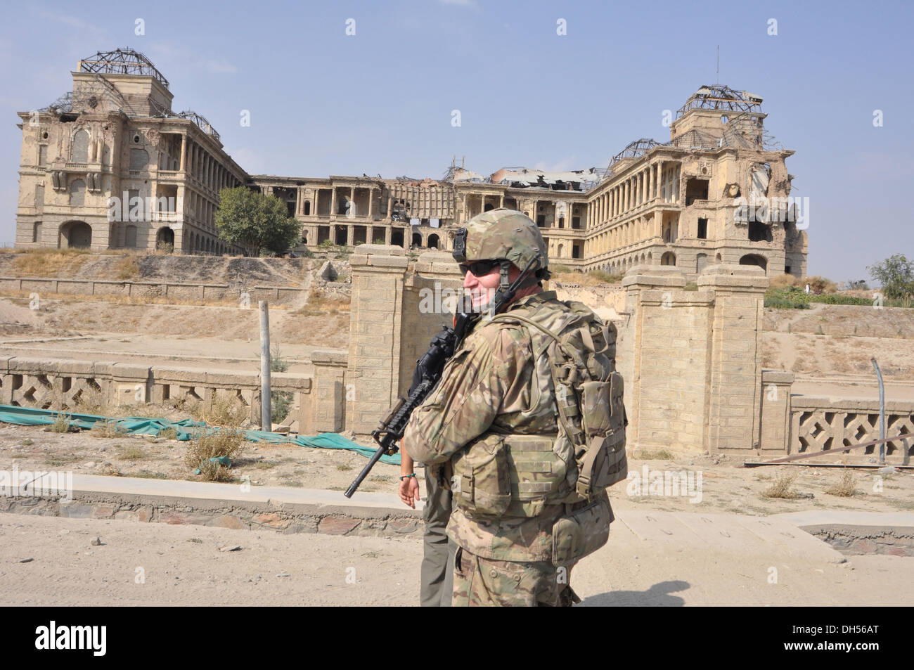 THE PALACE POLICE -- Spc. Eamonn Soll, a medic/emergency care specialist with Headquarters Company, 1st Battalion, 294th Infantry Regiment, Guam Army National Guard, performs the role of a guardian angel at Darulaman Palace, Kabul, Afghanistan. The once-f Stock Photo