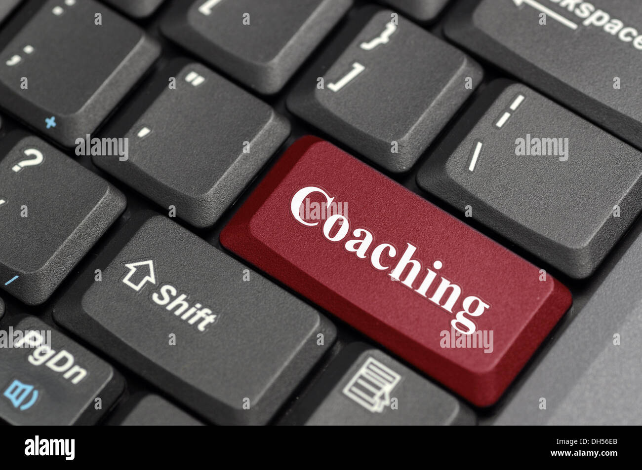 Coaching on keyboard Stock Photo