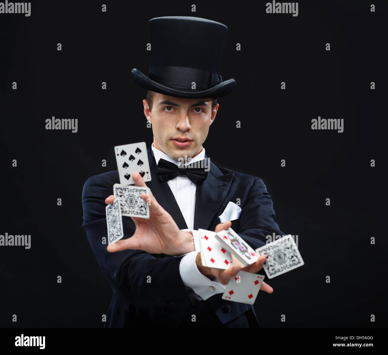 magician showing trick with playing cards Stock Photo Alamy