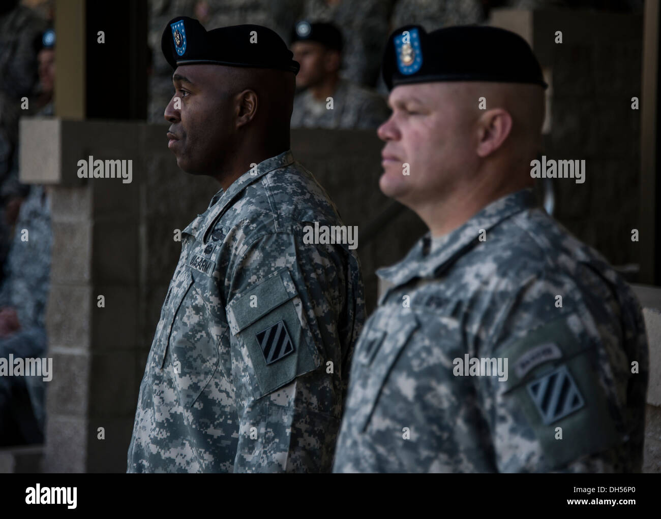 Command Sgt. Maj. Jefferson Moser (right), a native of Dearborn, Mich., and the outgoing senior enlisted leader for the 2nd Armored Brigade Combat Team, 3rd Infantry Division, and Command Sgt. Maj. Stanley Varner (left), the incoming senior enlisted leade Stock Photo