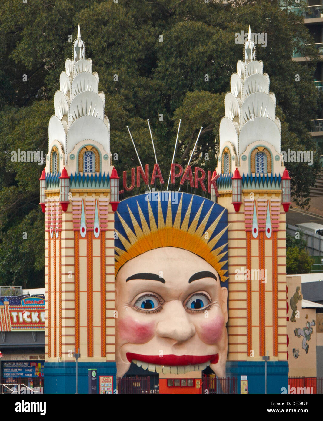 Iconic painted face and pillars at entrance to Luna Park amusement park beside harbour in Sydney NSW Australia Stock Photo