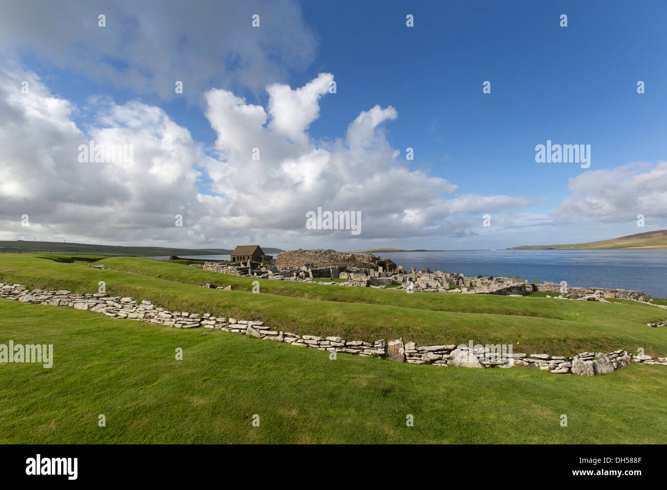 Islands of Orkney, Scotland. Picturesque view of the broch village at Gurness, with Eynhallow Sound in the background. Stock Photo