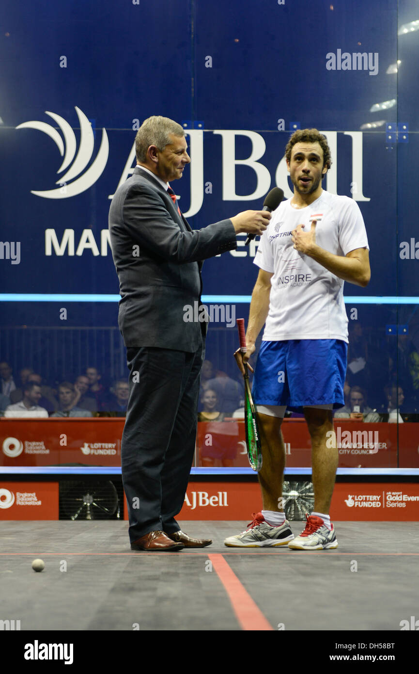 MANCHESTER, UK. Thursday 31st October 2013. Egypt's Ramy Ashour (in white) (Dunlop PSA World Ranking No.1) beat India's Saurav Ghosal (in blue) (Dunlop PSA World Ranking No.17) 3-0, after 48 mins in the Quarter Finals of the AJ Bell World Squash Championship at Manchester Central. 11-9, 11-5, 11-9, Ashour takes his place in the semi-finals to be played on Saturday 2nd November. Stock Photo